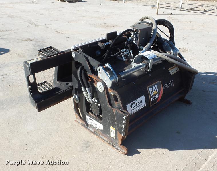 image for item DA0914 2008 Caterpillar PC210 skid steer planer