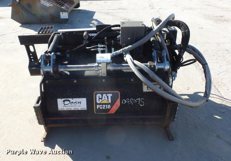 image for item DA0914 2008 Caterpillar PC210 skid steer planer