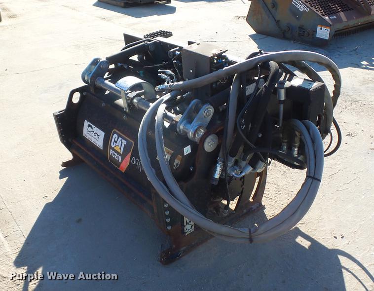 image for item DA0914 2008 Caterpillar PC210 skid steer planer