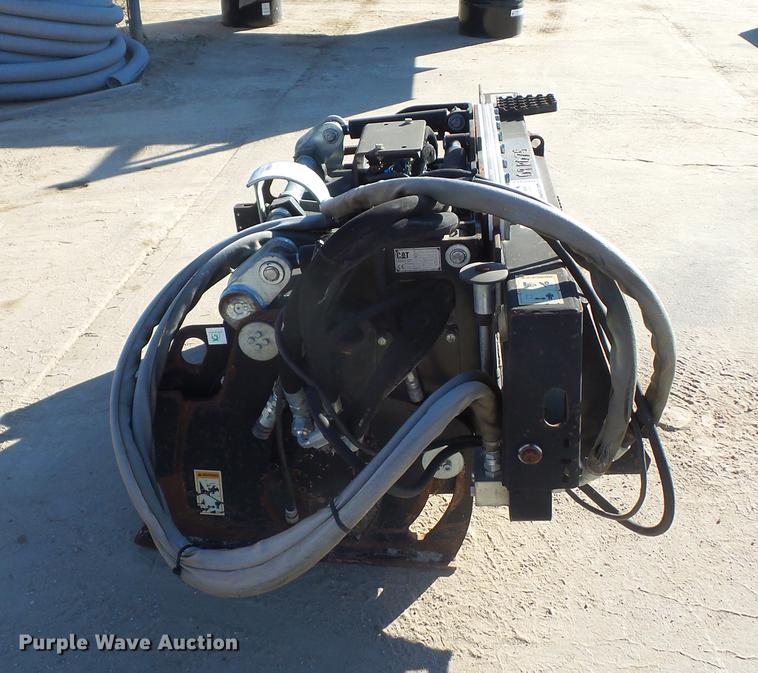 image for item DA0914 2008 Caterpillar PC210 skid steer planer