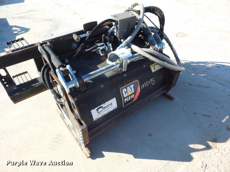 image for item DA0914 2008 Caterpillar PC210 skid steer planer