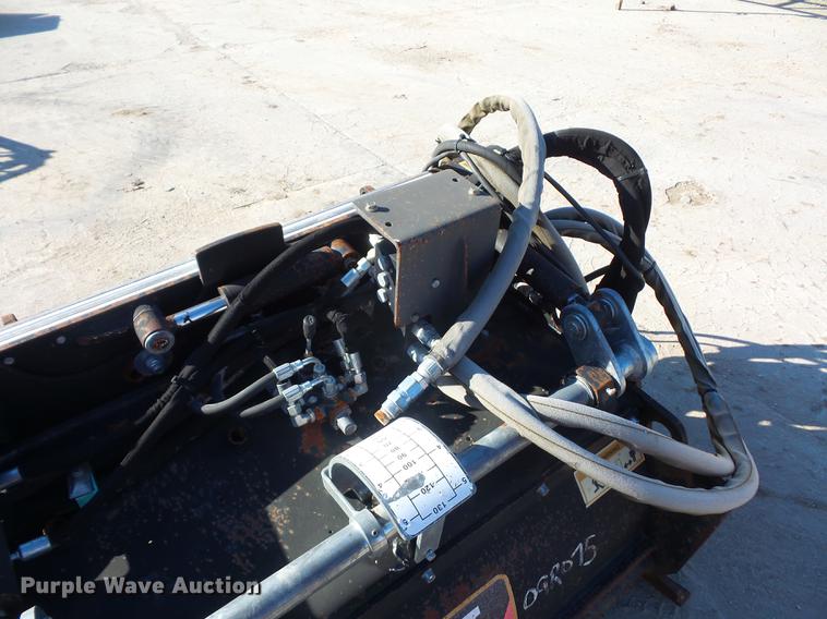 image for item DA0914 2008 Caterpillar PC210 skid steer planer