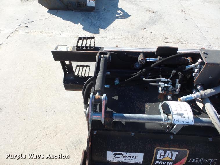 image for item DA0914 2008 Caterpillar PC210 skid steer planer