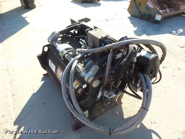 image for item DA0914 2008 Caterpillar PC210 skid steer planer