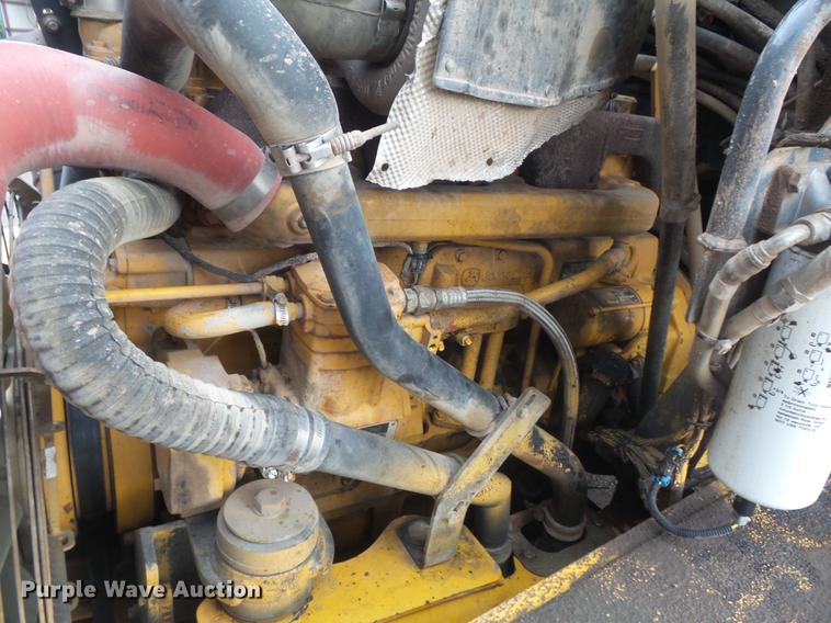 image for item DB6390 2004 John Deere 250D articulated haul truck