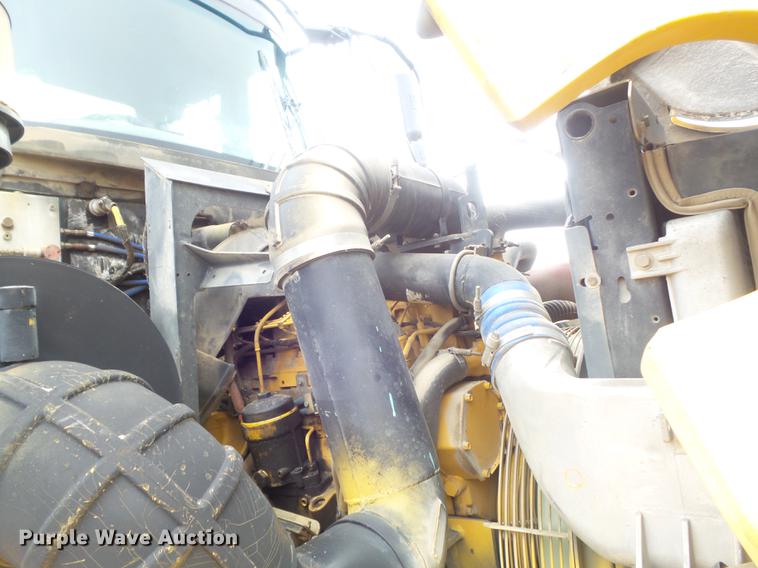 image for item DB6390 2004 John Deere 250D articulated haul truck