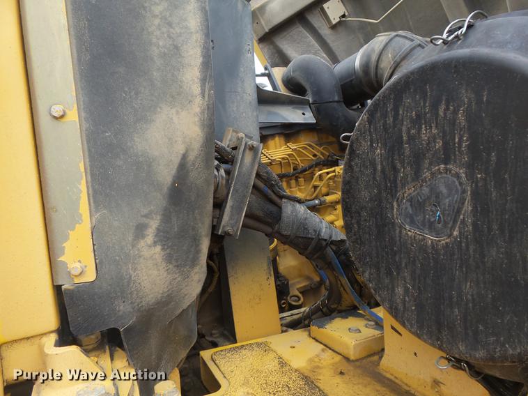 image for item DB6390 2004 John Deere 250D articulated haul truck