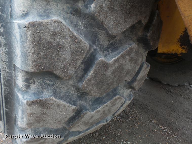 image for item DB6390 2004 John Deere 250D articulated haul truck