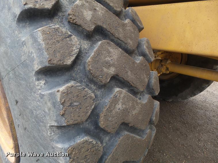 image for item DB6390 2004 John Deere 250D articulated haul truck