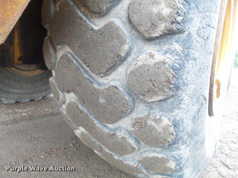 image for item DB6390 2004 John Deere 250D articulated haul truck