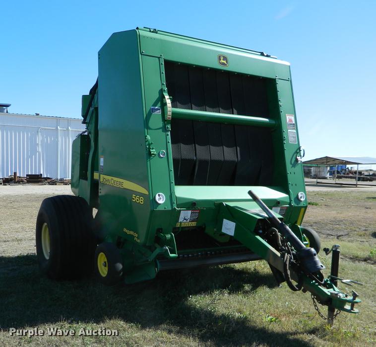 image for item DB1161 2011 John Deere 568 round baler