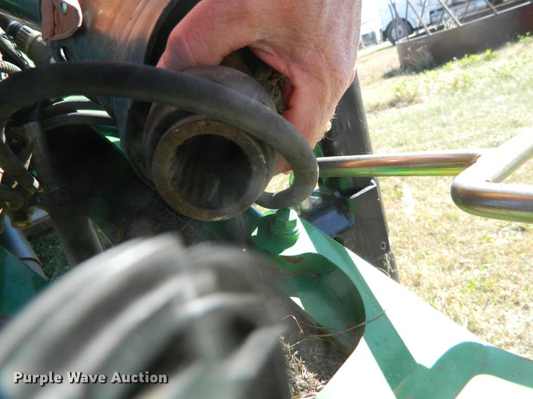 image for item DB1161 2011 John Deere 568 round baler