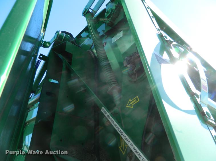 image for item DB1161 2011 John Deere 568 round baler