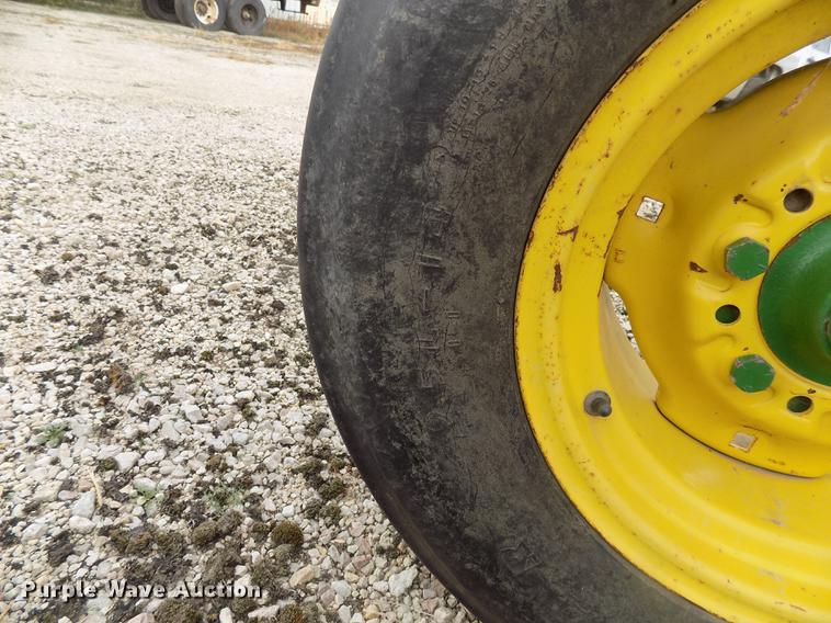 image for item DC4771 John Deere 2810 eight bottom plow