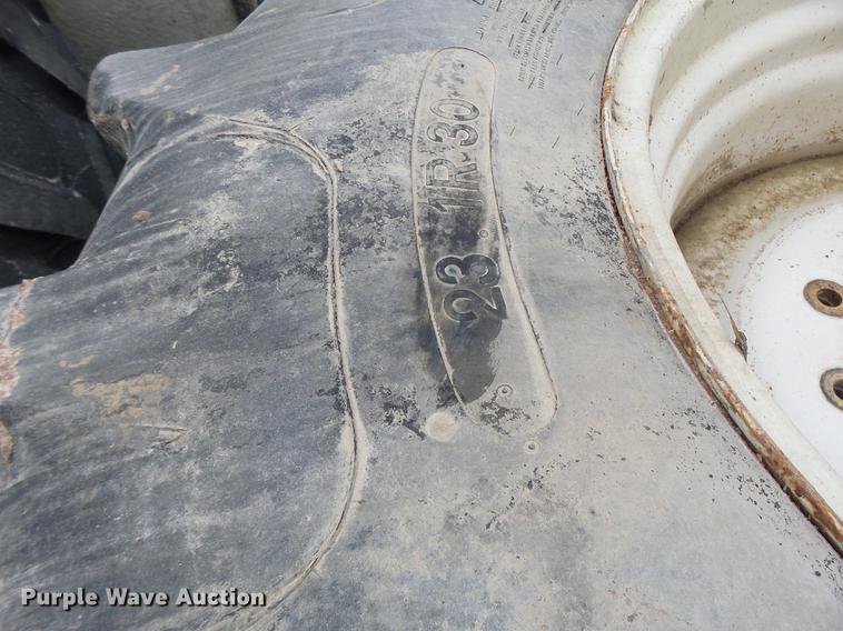 image for item DT9988 (4) Titan 23.1R30 tires