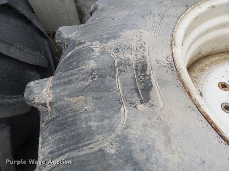 image for item DT9988 (4) Titan 23.1R30 tires