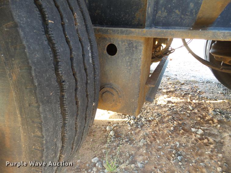 image for item BJ9945 2000 Kalyn MRG-35T Ext drop deck oilfield trailer