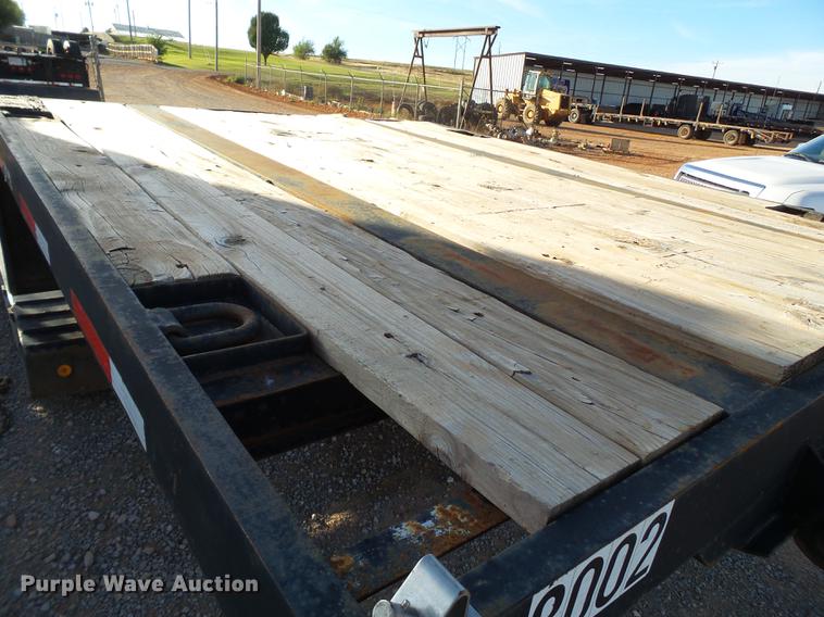 image for item BJ9945 2000 Kalyn MRG-35T Ext drop deck oilfield trailer