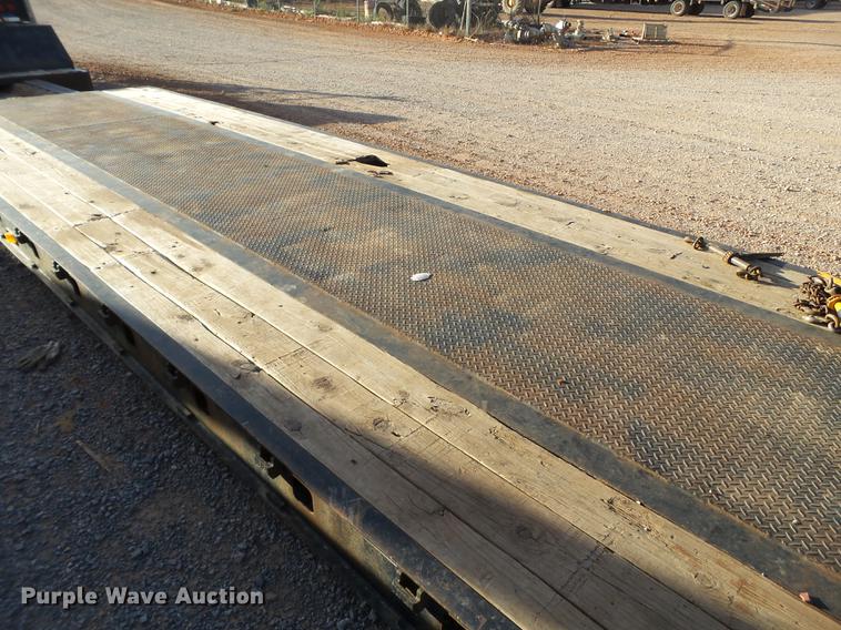 image for item BJ9945 2000 Kalyn MRG-35T Ext drop deck oilfield trailer