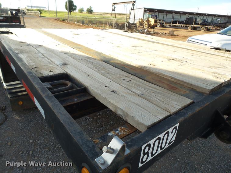 image for item BJ9945 2000 Kalyn MRG-35T Ext drop deck oilfield trailer