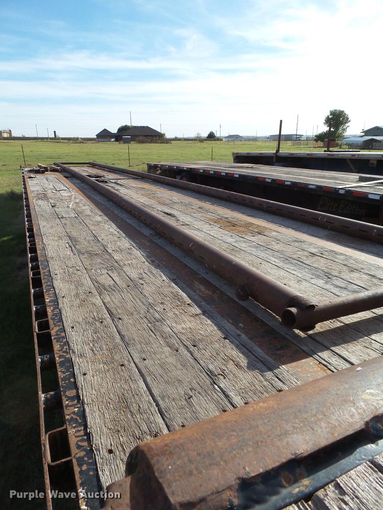 image for item BJ9947 2007 Doonan 532DC12L drop deck oilfield trailer