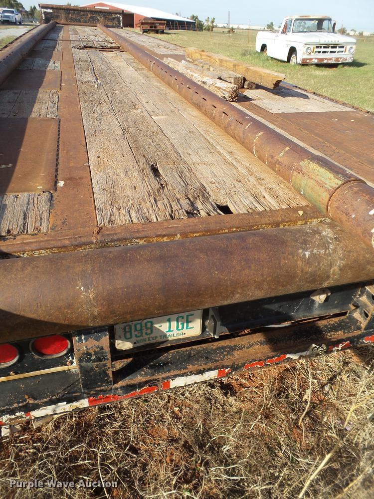 image for item BJ9947 2007 Doonan 532DC12L drop deck oilfield trailer