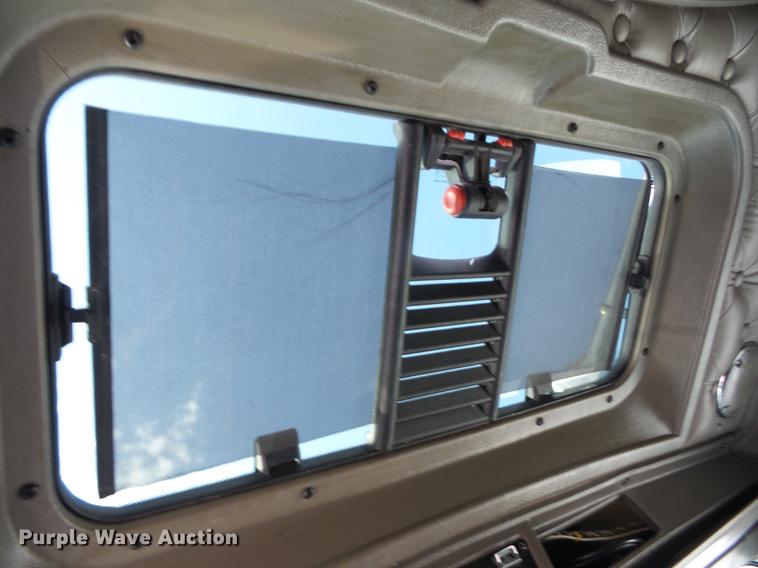 image for item K6361 2005 Kenworth W900 semi truck with tow truck attachment