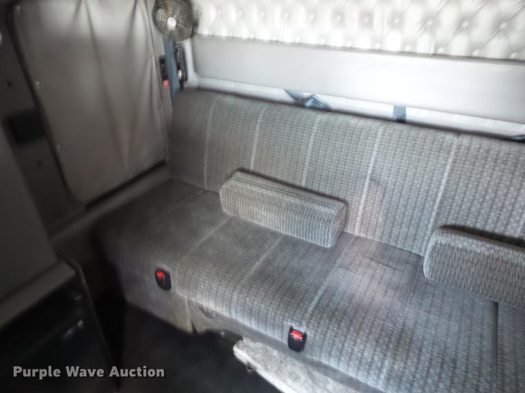 image for item K6361 2005 Kenworth W900 semi truck with tow truck attachment