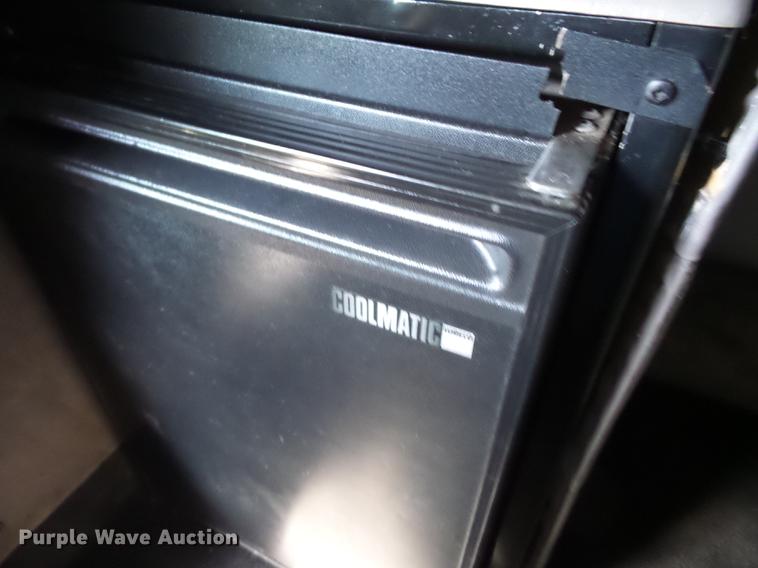 image for item K6361 2005 Kenworth W900 semi truck with tow truck attachment