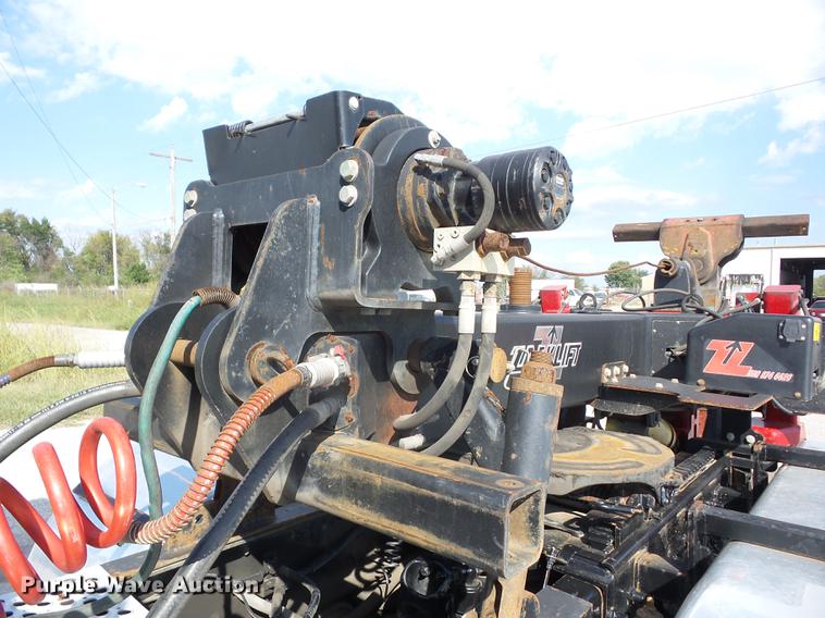 image for item K6361 2005 Kenworth W900 semi truck with tow truck attachment