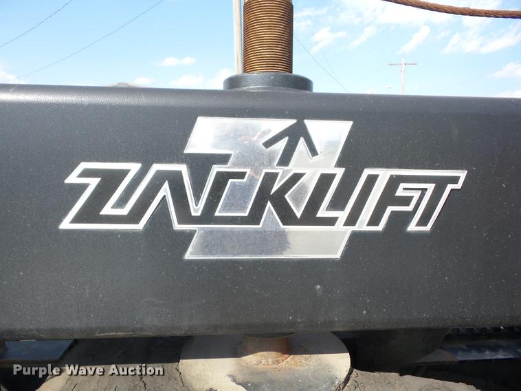 image for item K6361 2005 Kenworth W900 semi truck with tow truck attachment