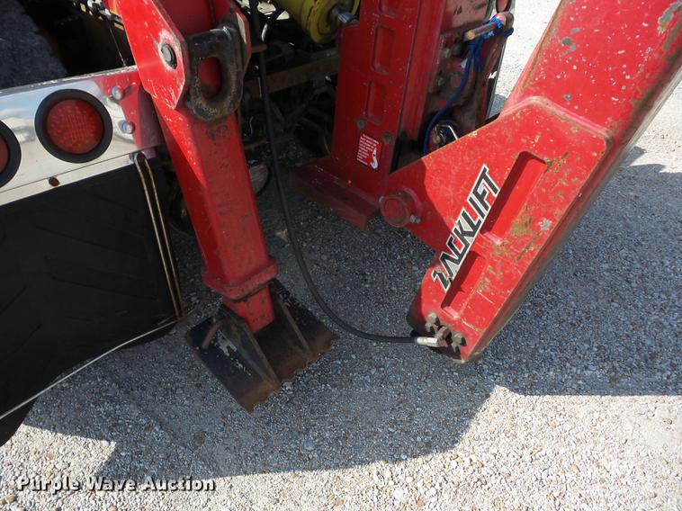 image for item K6361 2005 Kenworth W900 semi truck with tow truck attachment