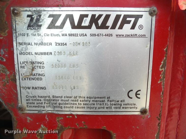 image for item K6361 2005 Kenworth W900 semi truck with tow truck attachment