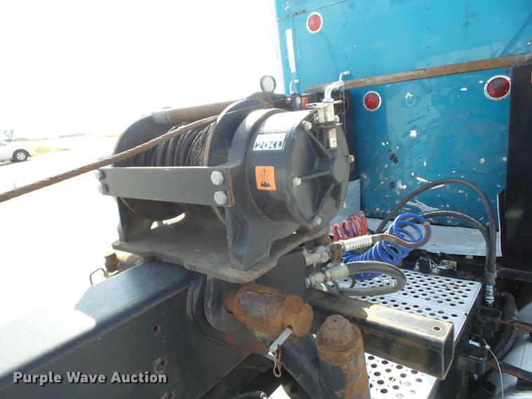 image for item K6361 2005 Kenworth W900 semi truck with tow truck attachment