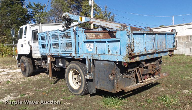 image for item DB6354 1990 Isuzu FTR flatbed truck with crane