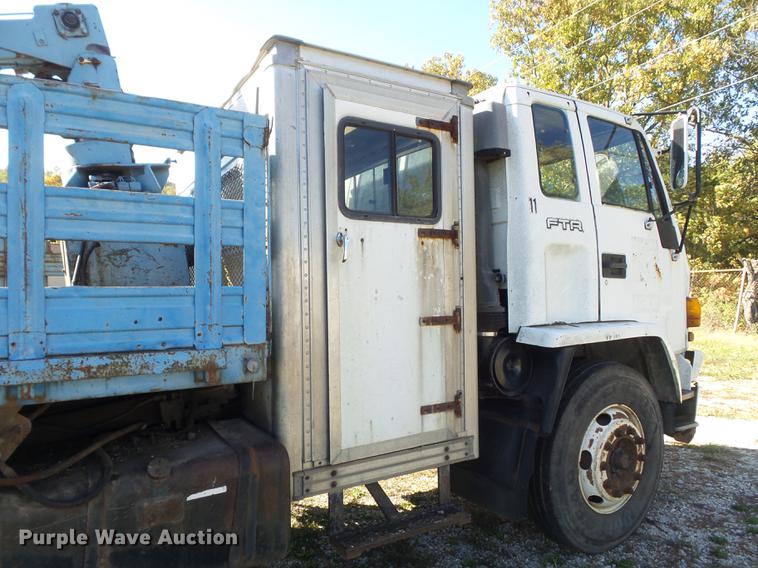 image for item DB6354 1990 Isuzu FTR flatbed truck with crane