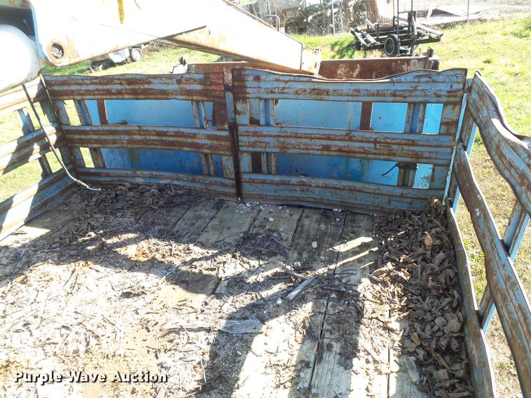 image for item DB6354 1990 Isuzu FTR flatbed truck with crane