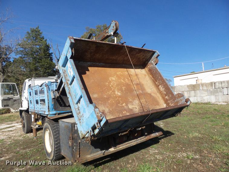 image for item DB6354 1990 Isuzu FTR flatbed truck with crane