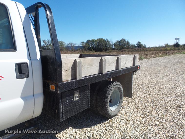 image for item DB6361 2006 Ford F350 Super Duty XL flatbed pickup truck