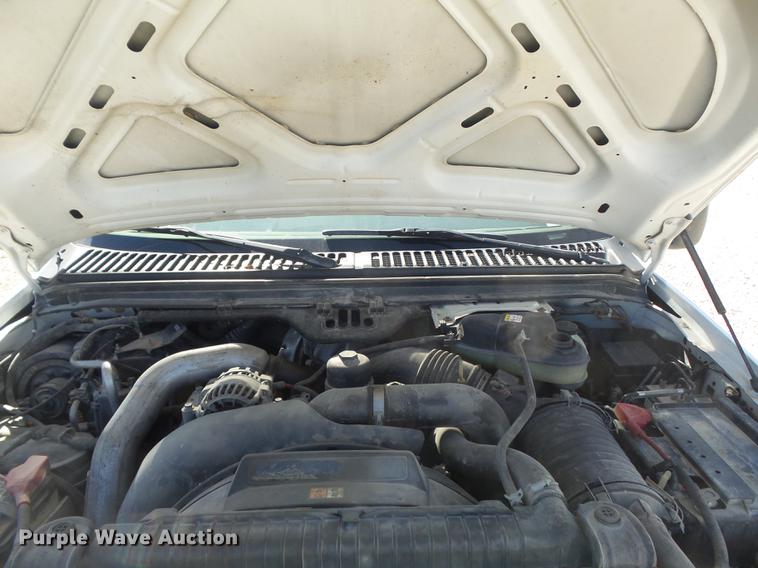 image for item DB6361 2006 Ford F350 Super Duty XL flatbed pickup truck