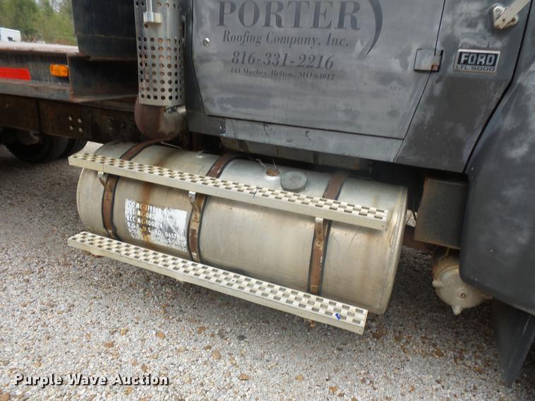 image for item DD9064 1987 Ford LTL9000 flatbed truck