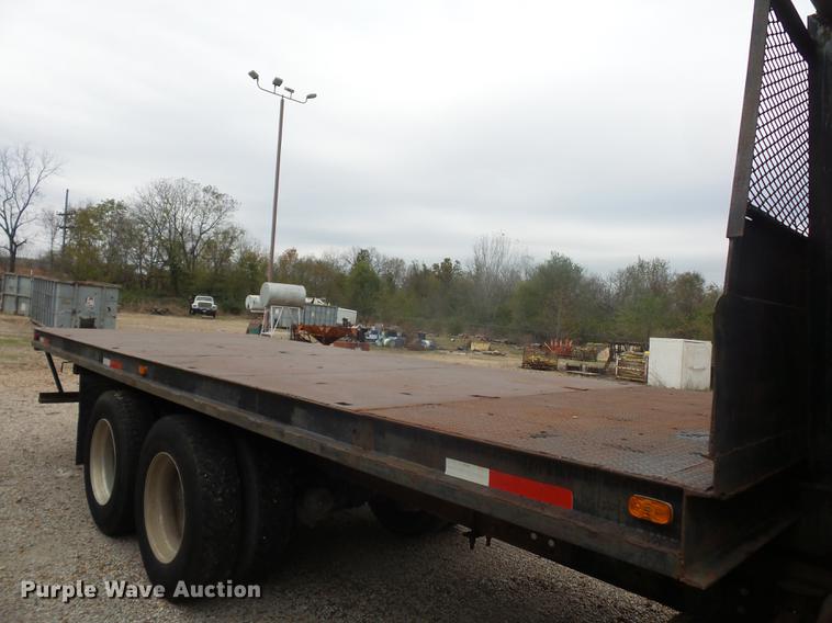 image for item DD9064 1987 Ford LTL9000 flatbed truck