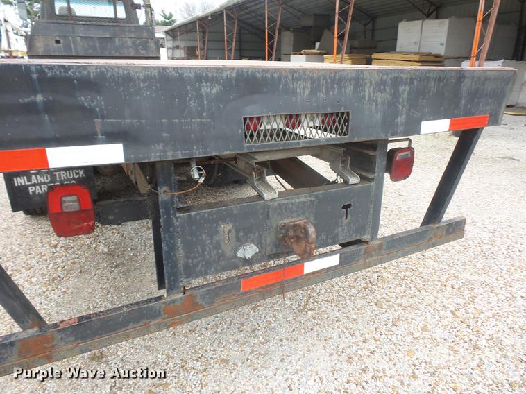 image for item DD9064 1987 Ford LTL9000 flatbed truck