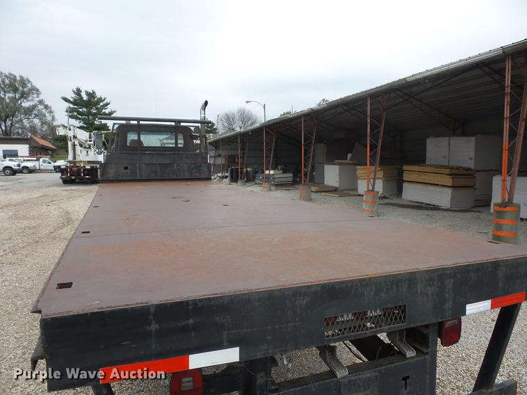 image for item DD9064 1987 Ford LTL9000 flatbed truck