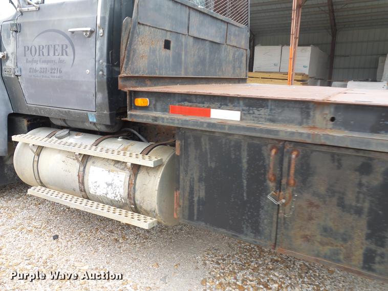 image for item DD9064 1987 Ford LTL9000 flatbed truck