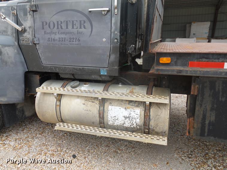 image for item DD9064 1987 Ford LTL9000 flatbed truck