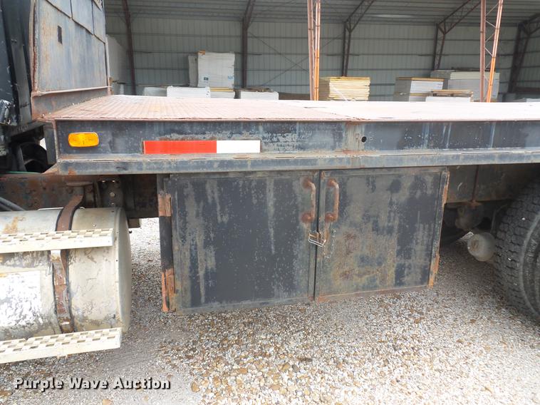 image for item DD9064 1987 Ford LTL9000 flatbed truck