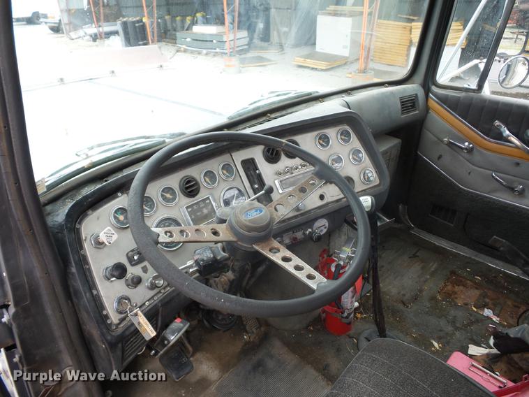 image for item DD9064 1987 Ford LTL9000 flatbed truck