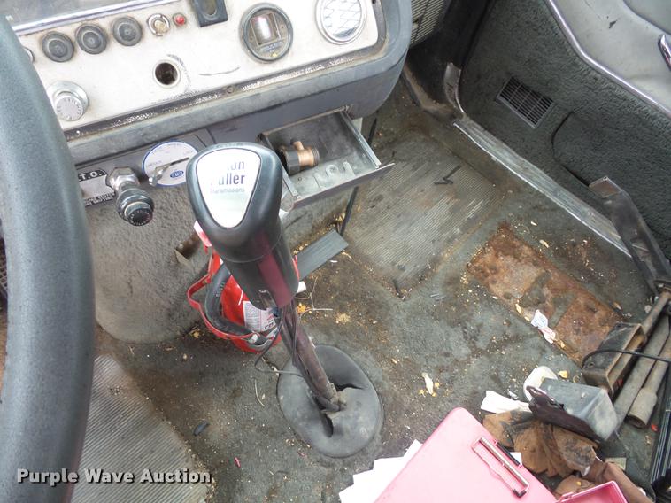 image for item DD9064 1987 Ford LTL9000 flatbed truck