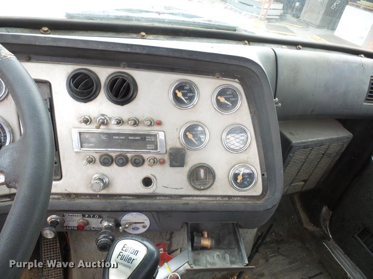 image for item DD9064 1987 Ford LTL9000 flatbed truck